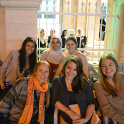 Professor Waed Athamneh and students at the double wedding of her brothers in Irbid, Jordan. Front row (from left): Sarah Huckins '14, Laurel Wolf '14 and Claire Brennan '13. Back row: Nicole Moomjy '12, Professor Waed Athamneh and Molly Vatis '14.