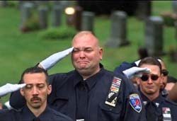 In this scene from the documentary, 'Historicizing 9/11,' first responders honor those who were killed in the 2001 terrorist attacks.