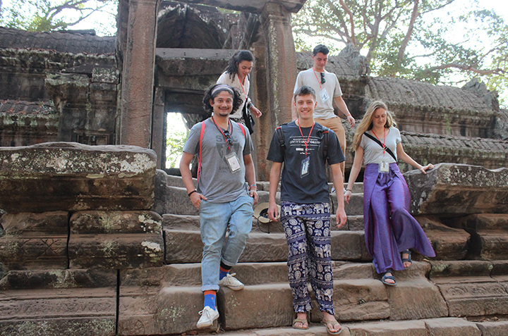 Morgan Kleyweg ’17, Maya Sullivan ’17, Jamie Drayton ’17, Corbin Maynard ’17, and Moriah McKenna ’17 descend the east gate steps at Angkor Wat in Cambodia.