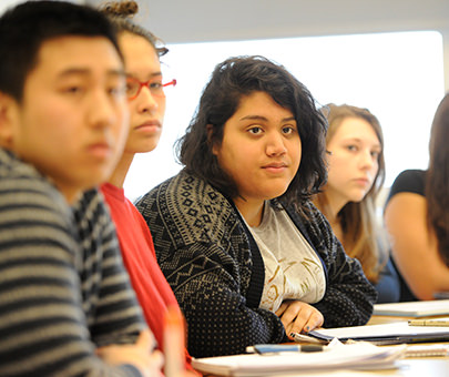 Psychology students listen to a lecture in the classroom. 