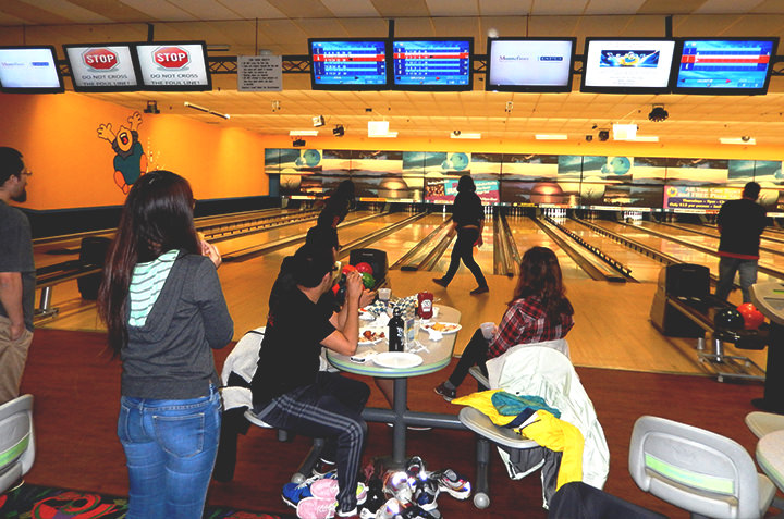Sociology students enjoy a bowling together. 