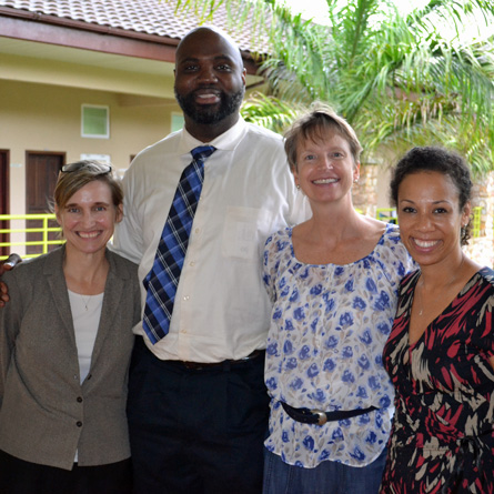 Suzanne Fox Buchele '85 (second from right) met with College faculty members Amy Dooling (far left), David Canton (center) and Courtney Baker during their recent trip to Ghana.