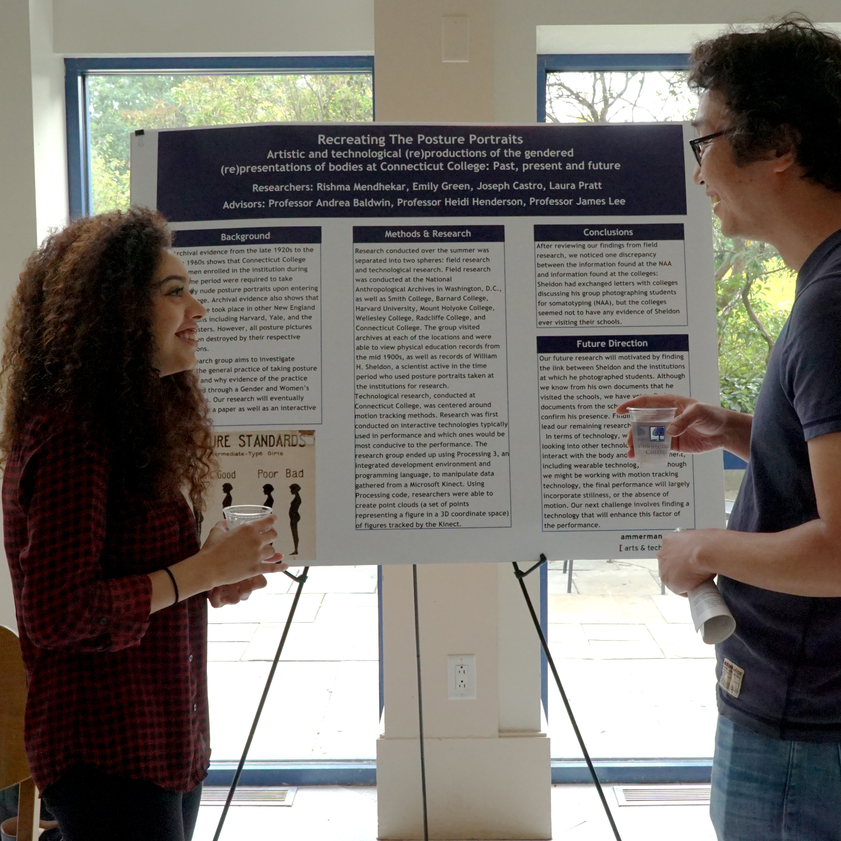 Rishma Mendhekar ’18 (left) discusses her summer research project with computer science professor James Lee.