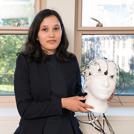 Linda He '22 presents research she conducted over the summer with Professor of Computer Science Gary Parker at the annual Summer Science Institute poster symposium Oct. 5.