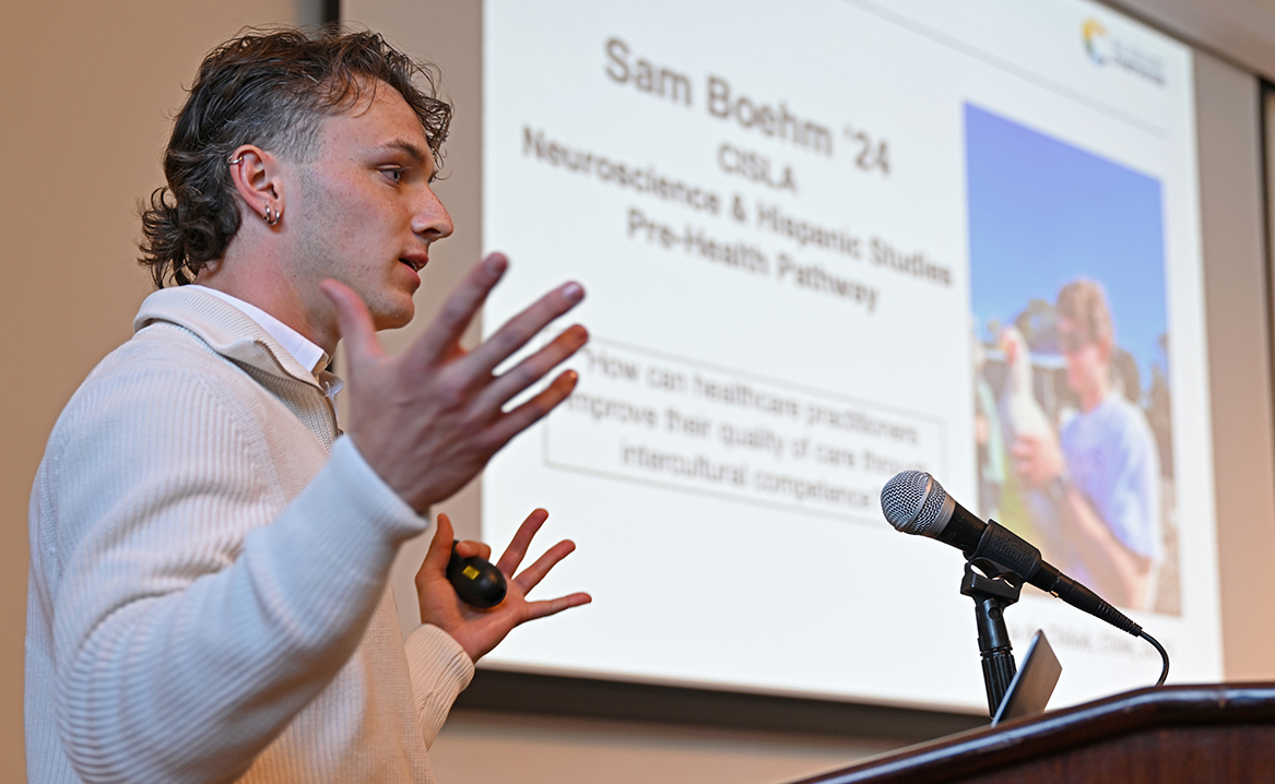 Sam Boehm ’24 presents at the All-College Symposium