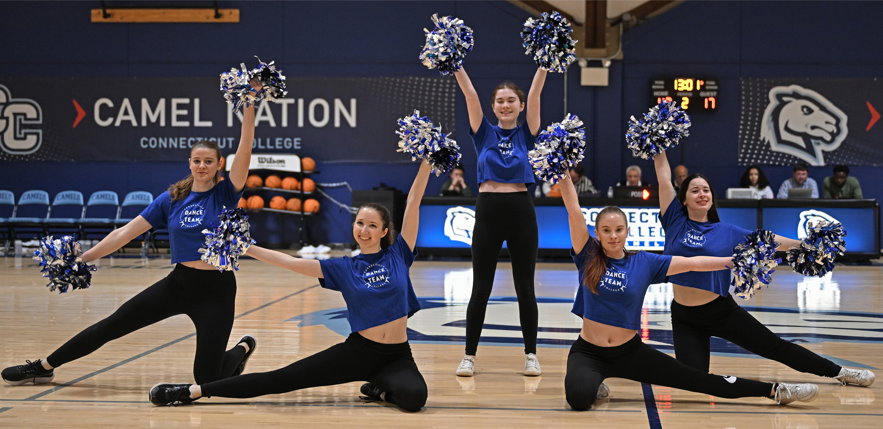 Dance squad cheers on women's basketball