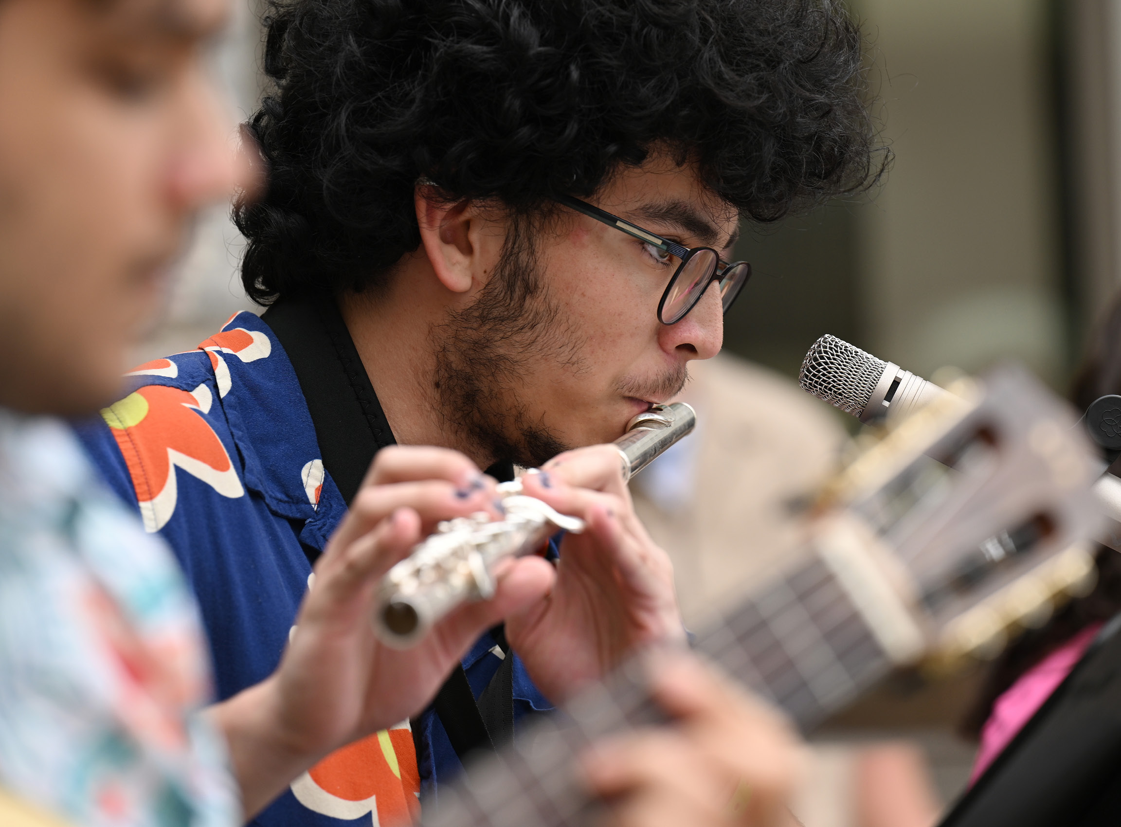 Close-up of student playing the flute