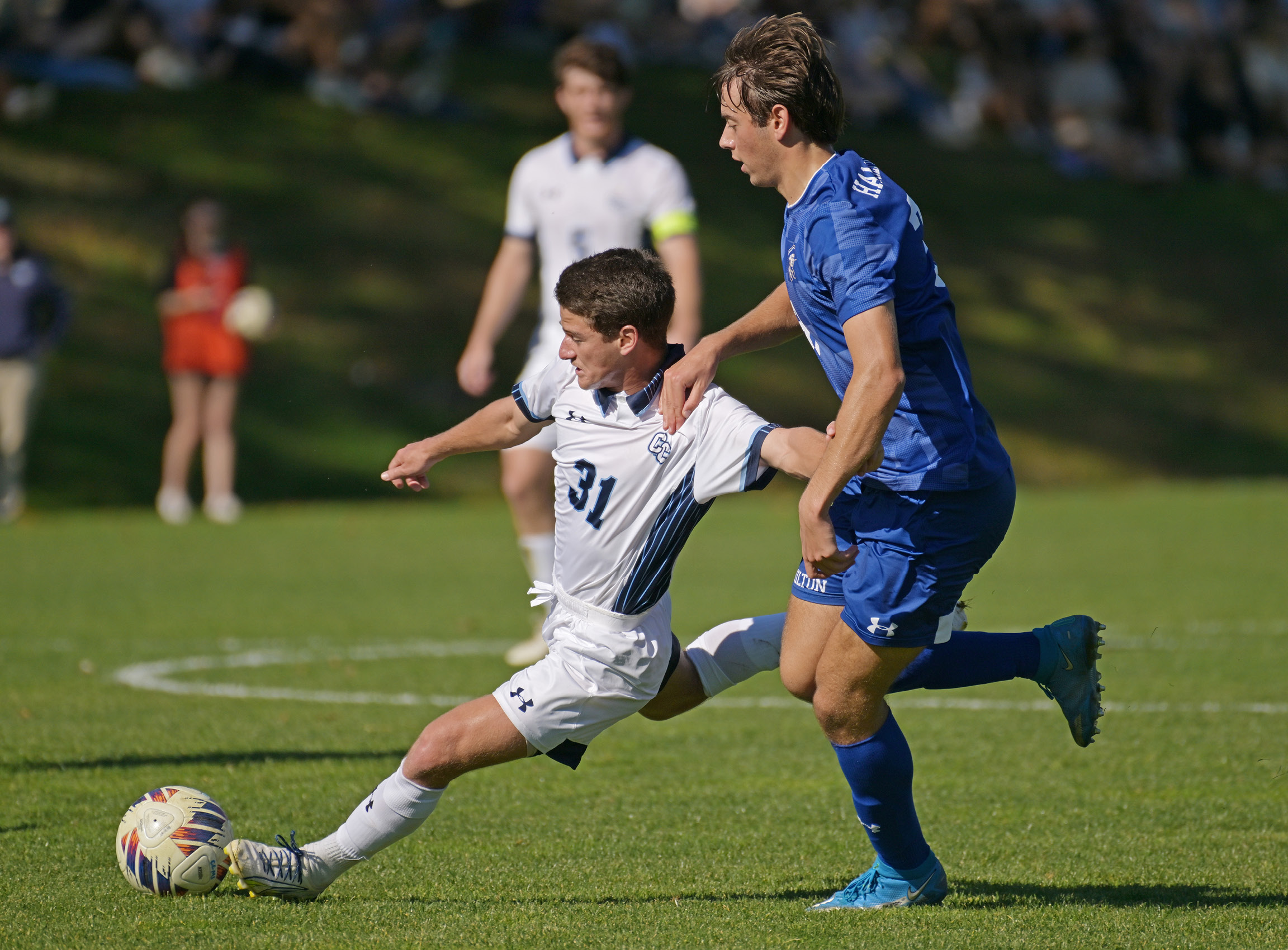 Jake Creus '24 powers past a Coast Guard player in non-league men’s soccer action Tuesday, October 10, 2023