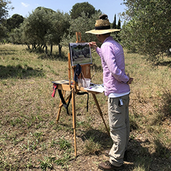 Professor Chris Barnard at work in the same olive grove where Van Gogh painted at the Saint Paul de Mausole Monastery.