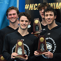 The 400 medley relay team wins 8th place at the NCAA championship.