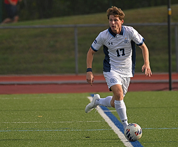 A photo of Jake Creus '24 playing soccer at Conn.
