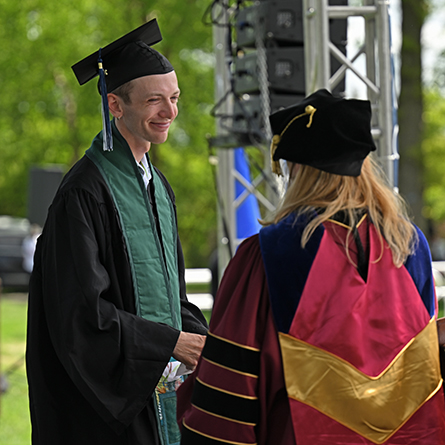 Skyler Kardell ’25 accepts the 2025 Claire Gaudiani ’66 Prize at Connecticut College’s 107th Commencement on May 18.