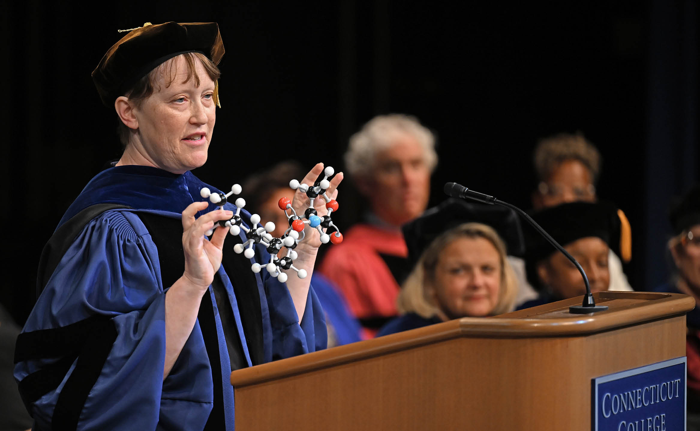 Hans and Ella McCollum ’21 Vahlteich Associate Professor of Chemistry Tanya L. Schneider addresses the audience during 111th Convocation.