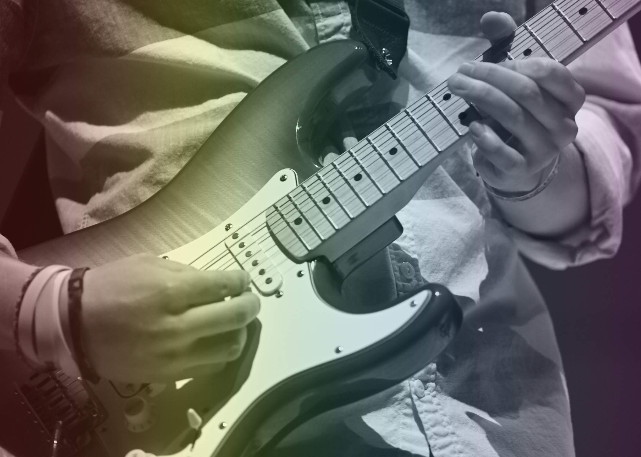 close-up of a guitar being played