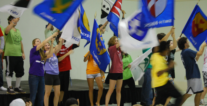 Students waving flags